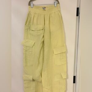 Linen pale yellow cargo pants cinched